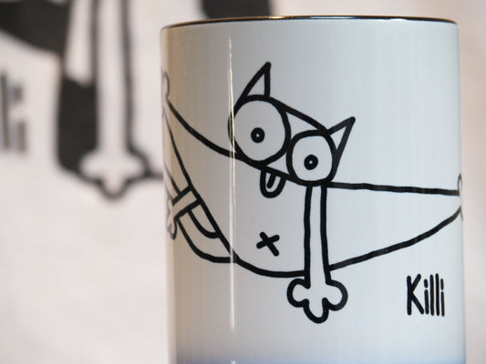 Mug self grooming cat black white doodle