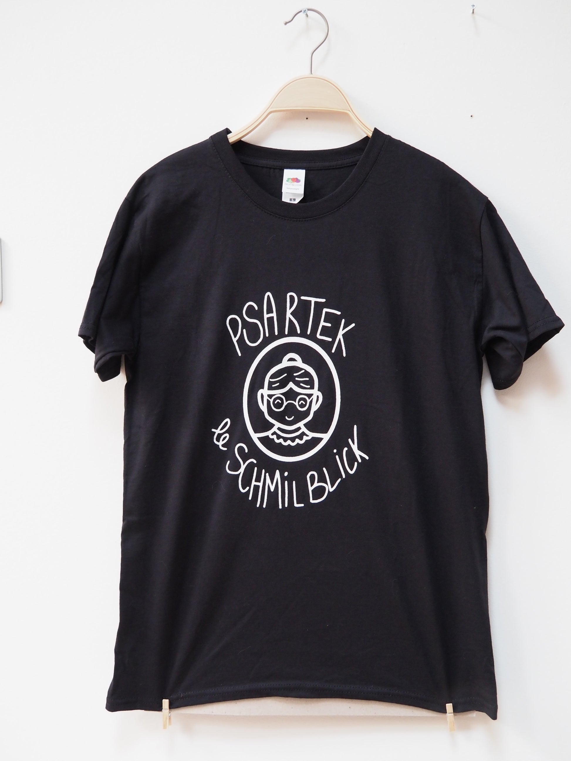 Black t-shirt with white graphic design of a grandma on a white background